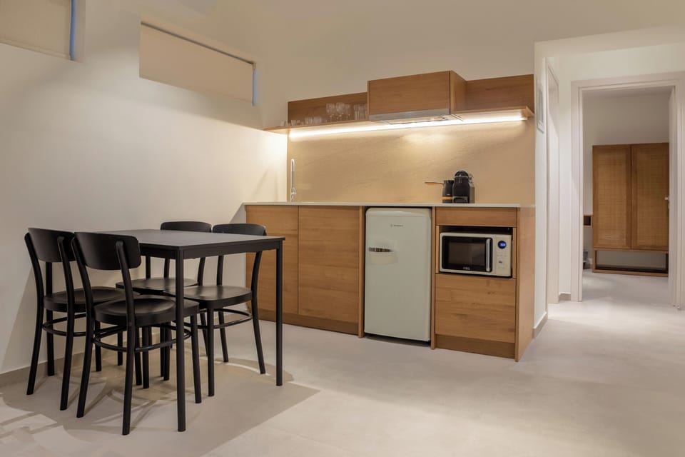 Family One Bedroom Suite | Private kitchenette | Fridge, microwave, espresso maker, coffee/tea maker