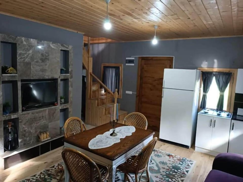 Romantic Villa | Living area | 32-inch LED TV with cable channels