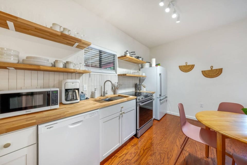 Small but mighty kitchen with full-size appliances (dishwasher, range/oven, and refrigerator)