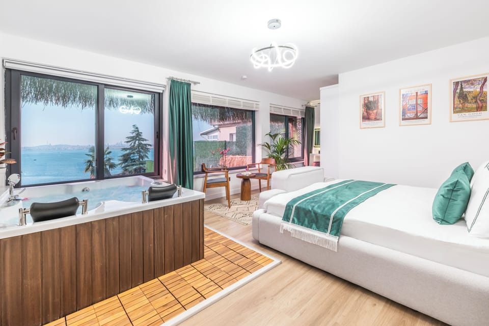 Luxury Room, Sea View | In-room safe, desk, laptop workspace, blackout drapes