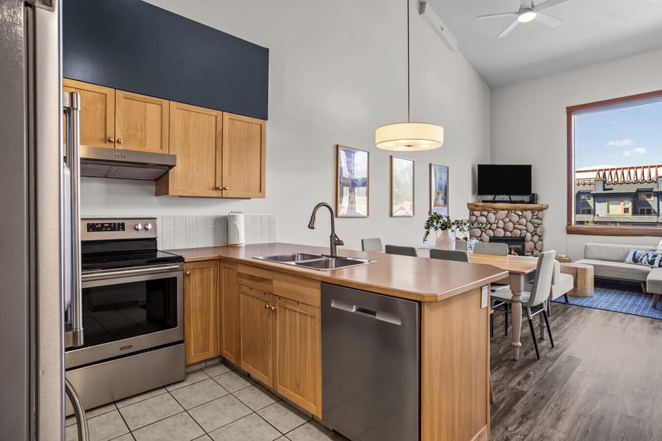 Boasting high vaulted ceilings, the penthouse feels spacious and inviting