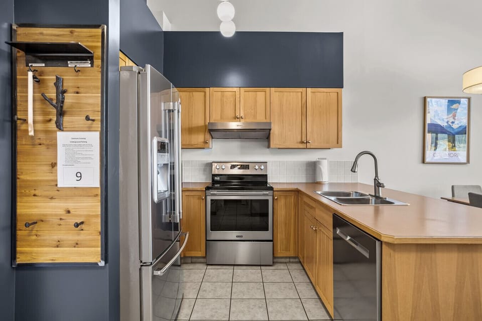 All new stainless steel appliances in the fully stocked kitchen