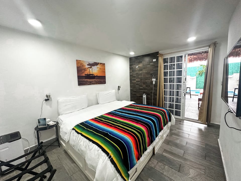 Standard Room, Pool View | Premium bedding, down comforters, pillowtop beds, individually decorated