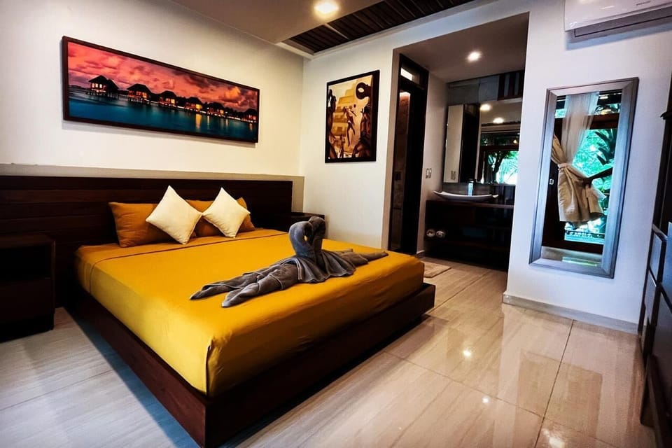 Deluxe Bungalow, Lagoon View | In-room safe, iron/ironing board, WiFi (free)