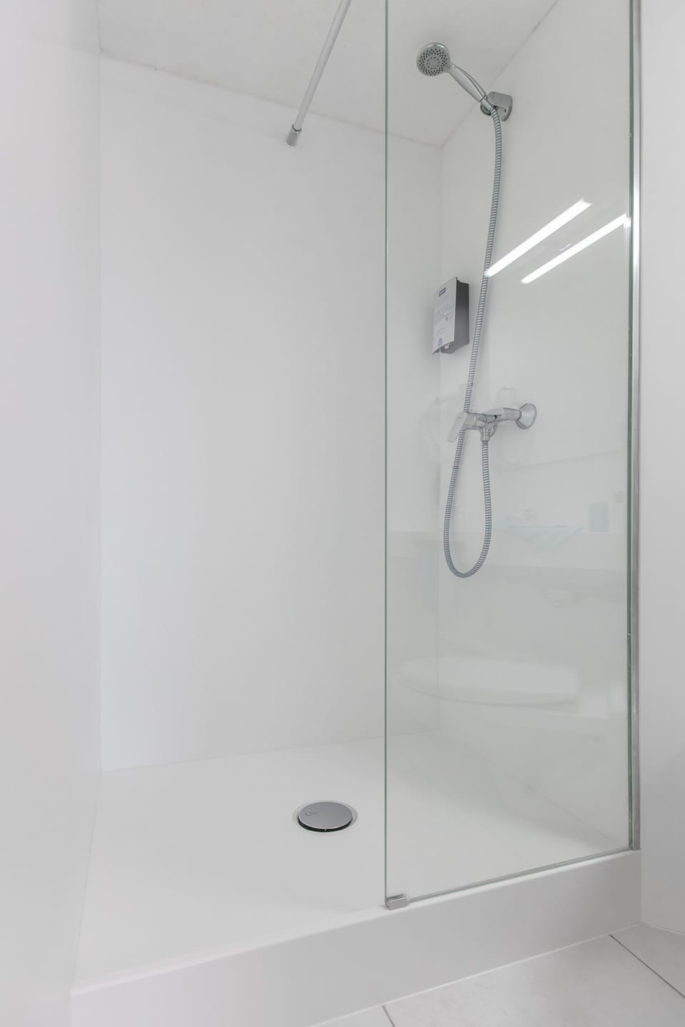 Shower, eco-friendly toiletries, hair dryer, towels