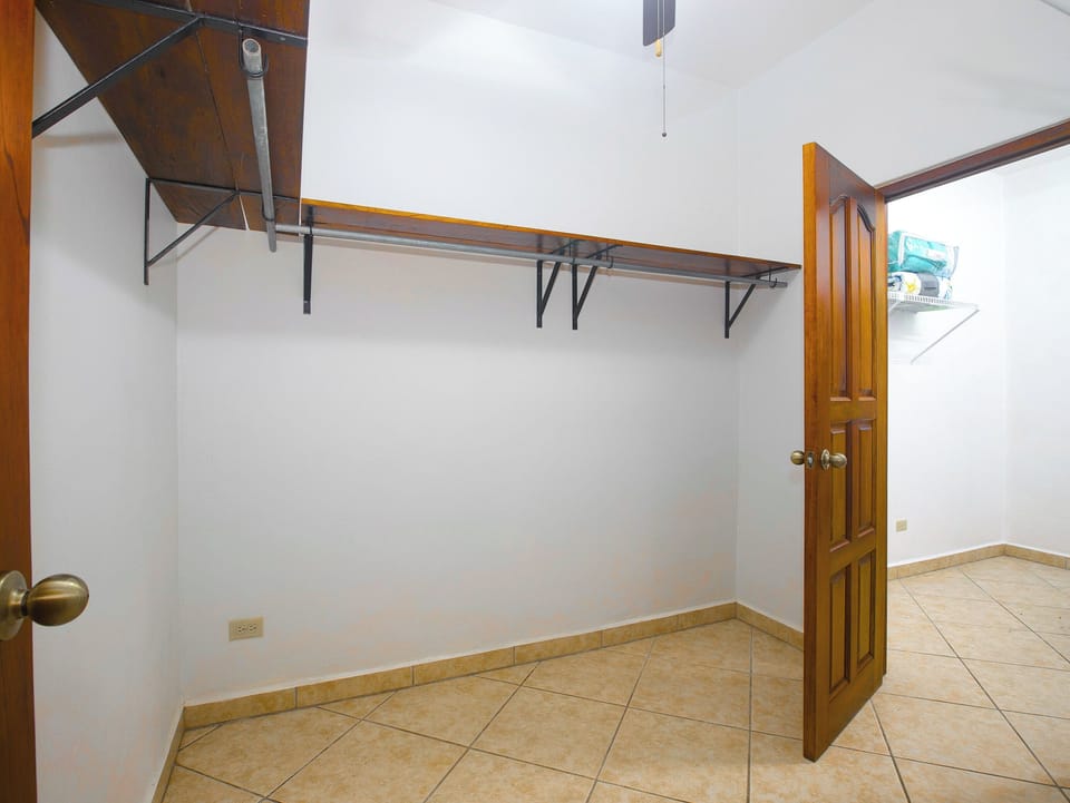 master bedroom walk in closet, queen sized air mattress is here for you to use 