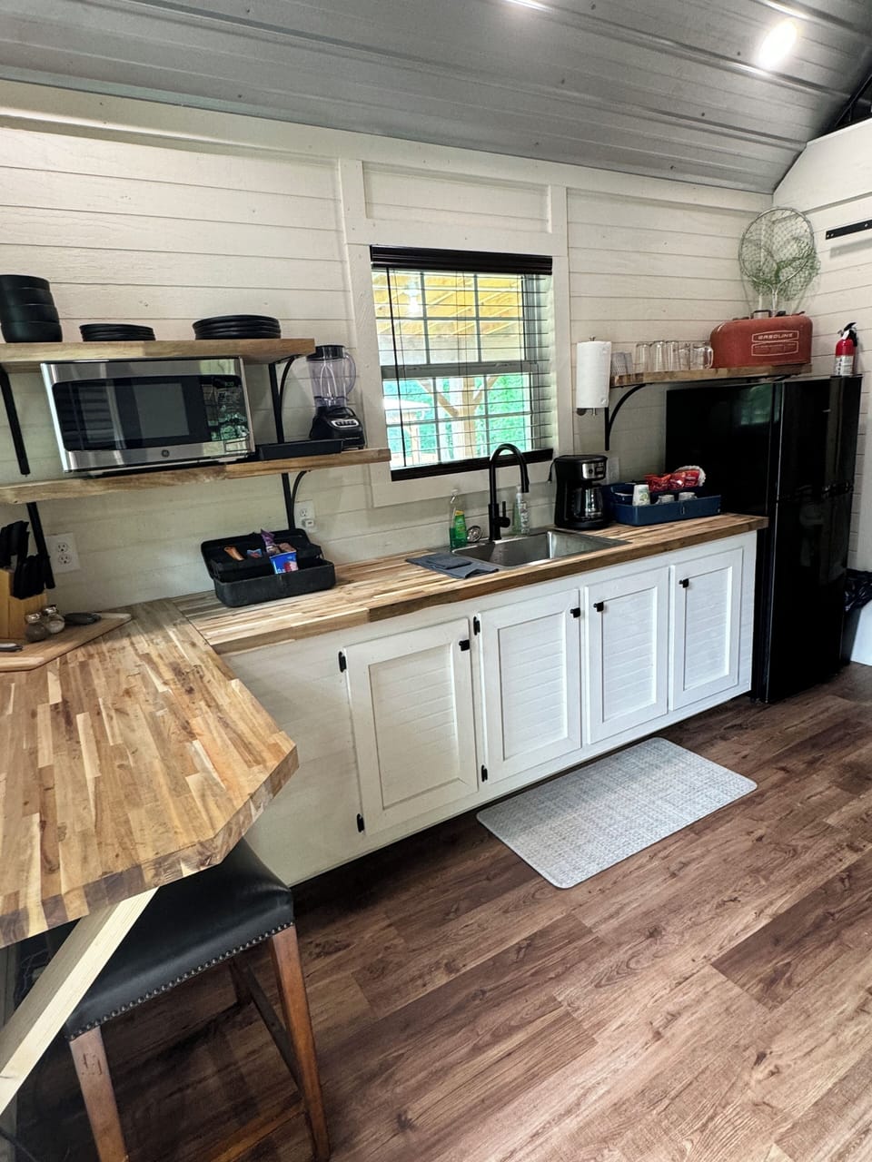 Spacious kitchenette contains microwave, refrigerator, snacks and coffee!