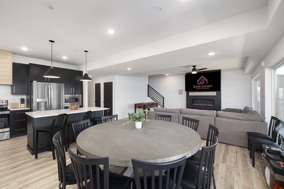 Main Level: Dining room w/ seating for 10 at dining table & seating 9 seatings at bar counters