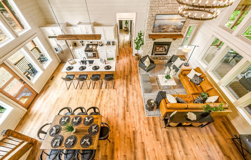 A bird's-eye view of our spacious living and dining area reveals a harmonious blend of style and comfort.