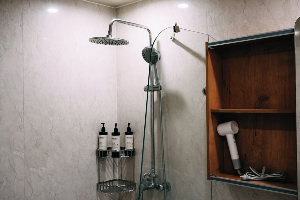 Shower, rainfall showerhead, hair dryer, slippers