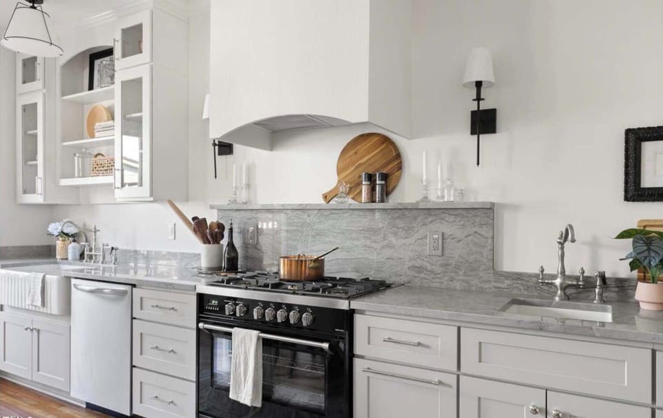 Custom hood vent over high end Italian gas range. 