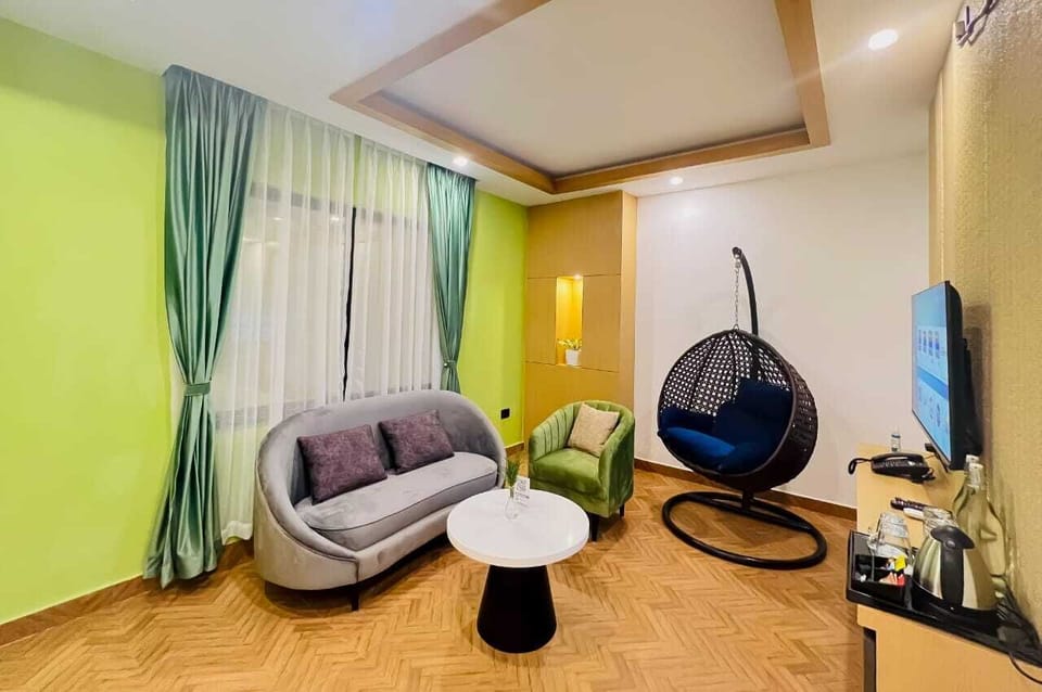 Executive Suite | Living area | 43-inch TV with digital channels
