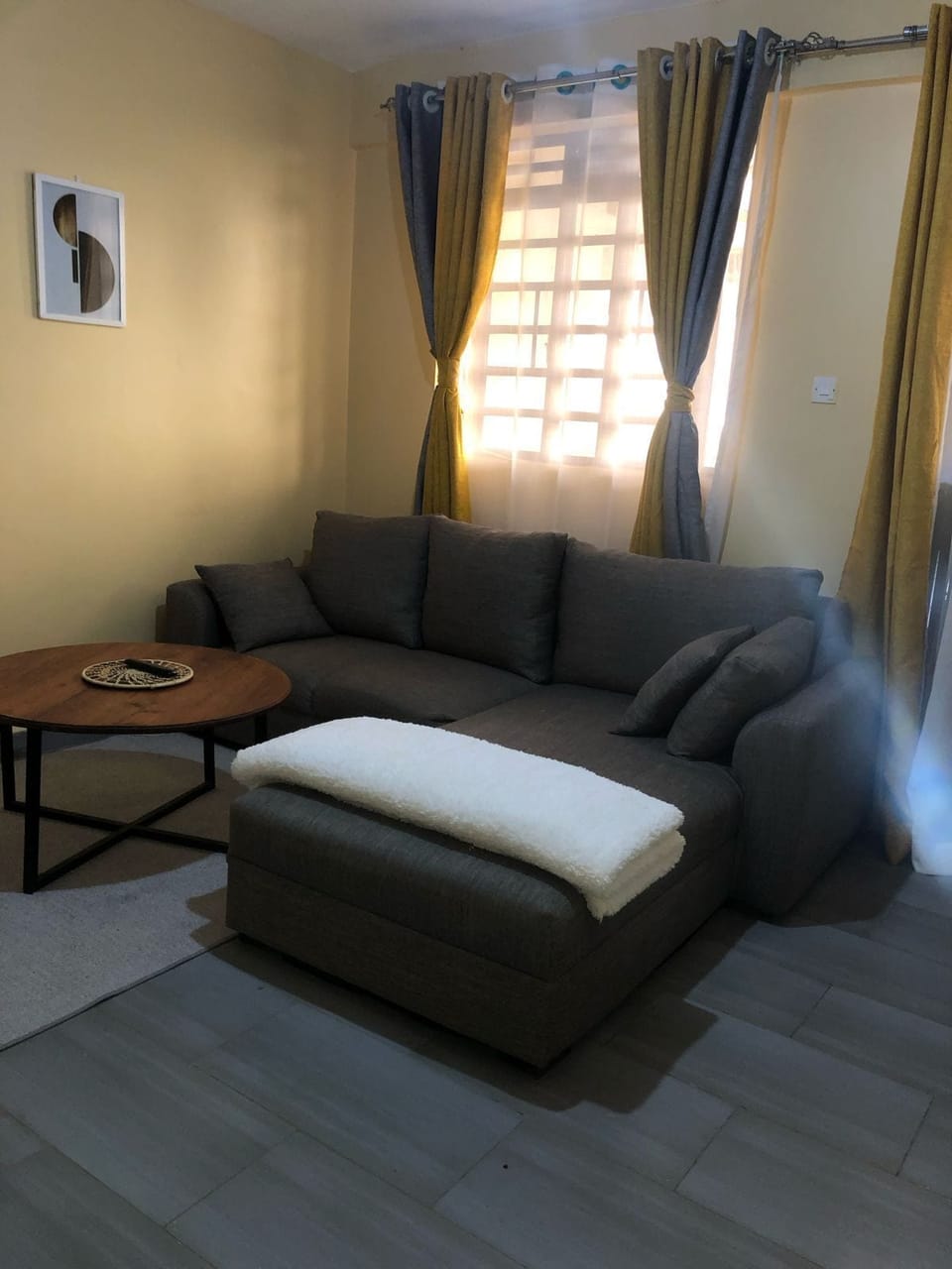 Deluxe Apartment, City View | Living area | 24-inch Smart TV with digital channels