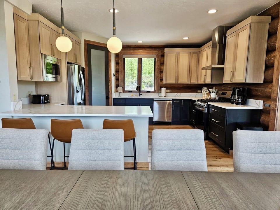 Our kitchen boasts a walk in pantry, and lots of cabinet space for longer stays.