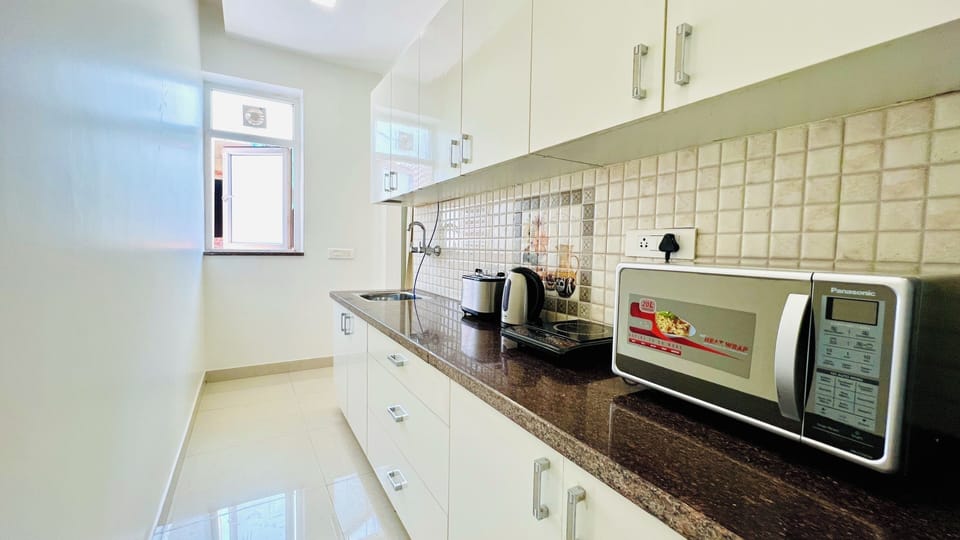 Fridge, microwave, stovetop, electric kettle