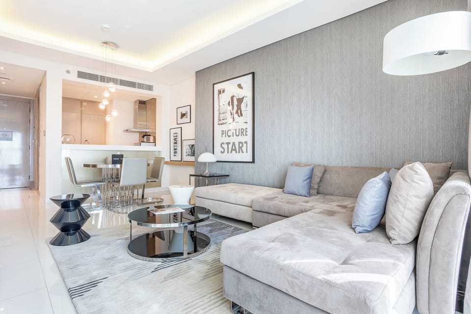 Executive Apartment | Living area | 40-inch flat-screen TV with cable channels