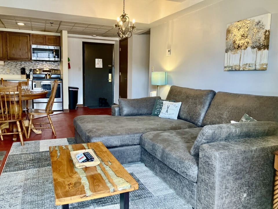 Open-concept living area connecting kitchen and dining space.