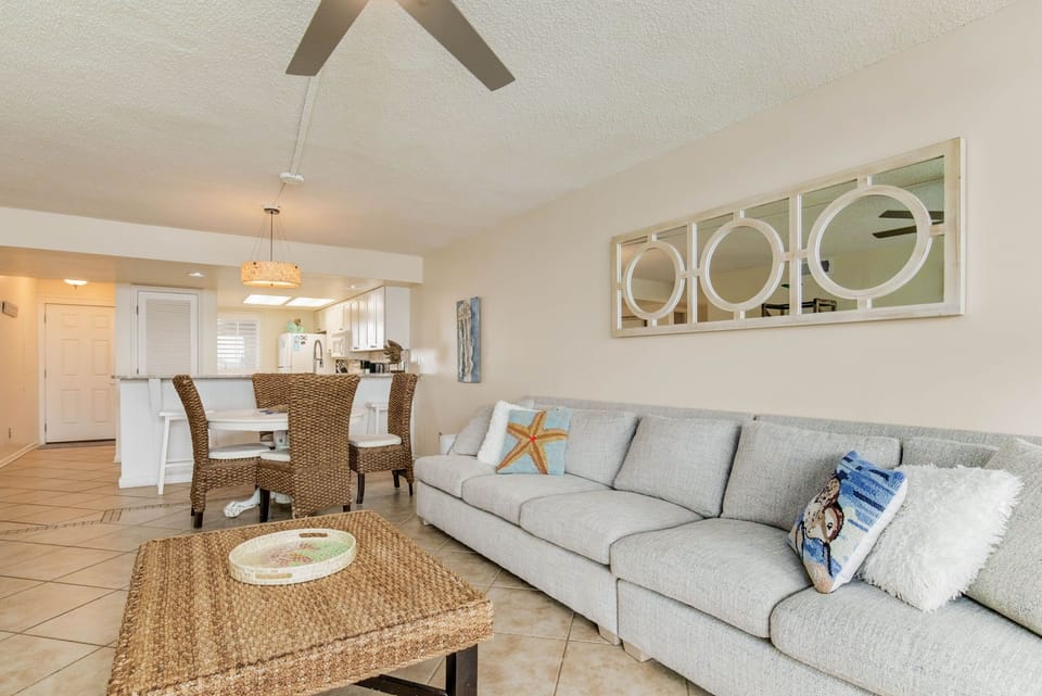 Open living space with tile flooring perfect for beach life at Wind Drift Orange Beach condo