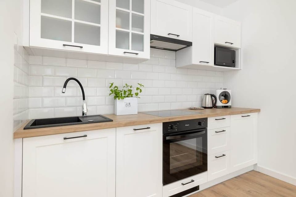 Kitchenette with a microwave.