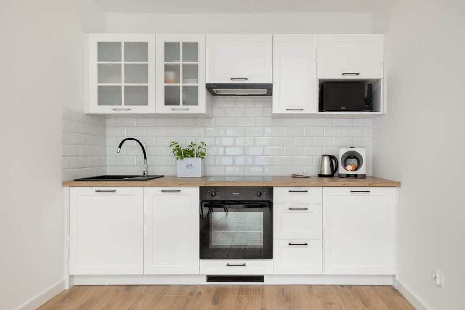Kitchenette with an oven.
