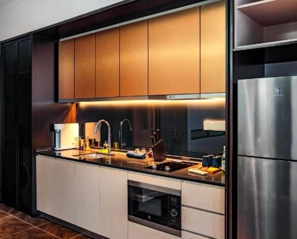 Family Suite, 2 Queen Beds | Private kitchen | Full-size fridge, microwave, oven, stovetop