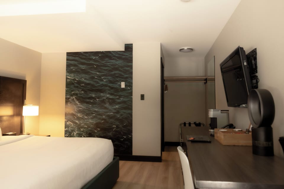 Standard Room, 1 King Bed (No View) | Living area | 40-inch LCD TV with cable channels, TV