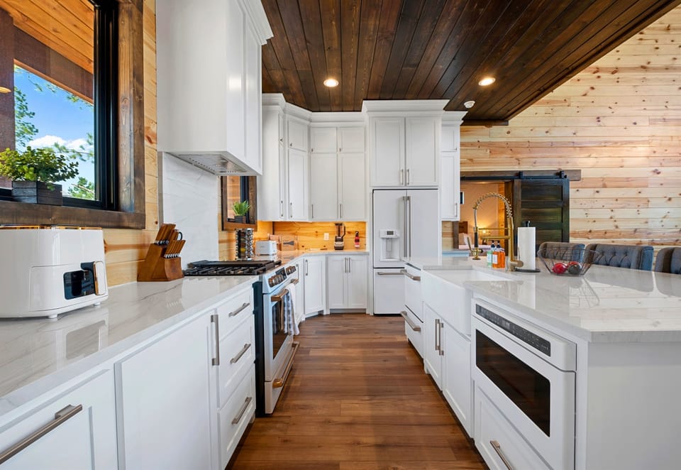 Stylish and functional, this kitchen has everything you need for cooking and socializing.