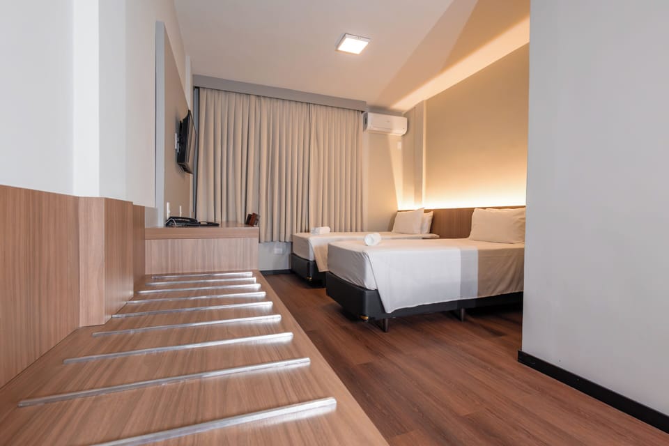 Deluxe Room | In-room safe, blackout drapes, soundproofing, iron/ironing board