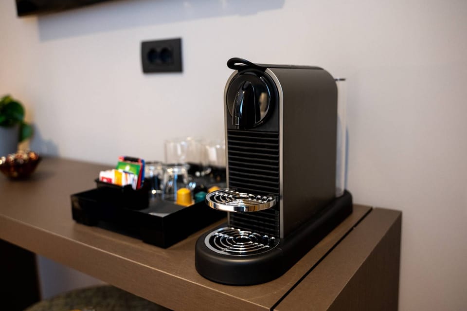 Deluxe Double Room, City View | Minibar, in-room safe, desk, laptop workspace