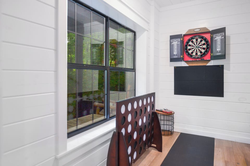 Lower level game room with dart board and connect for 