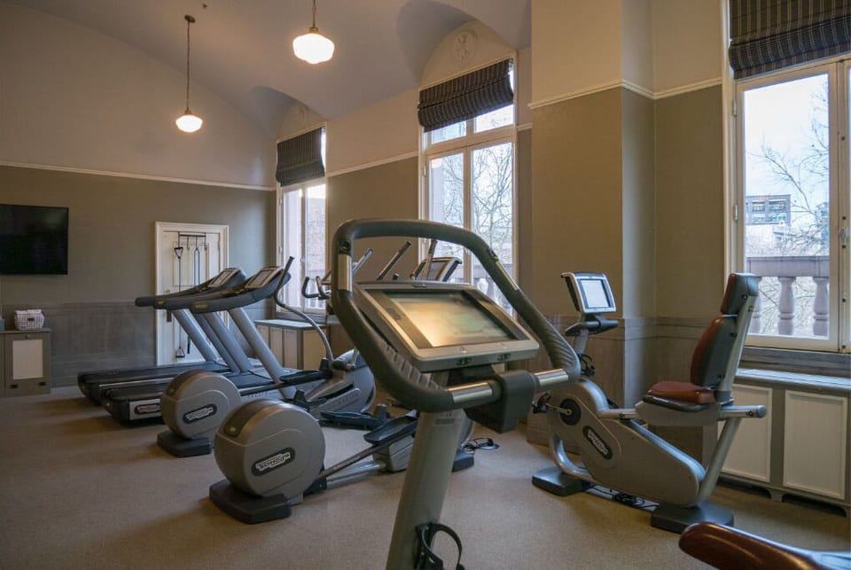 Stay fit during your stay with our fully equipped fitness center, featuring modern exercise machines and a bright, spacious environment.