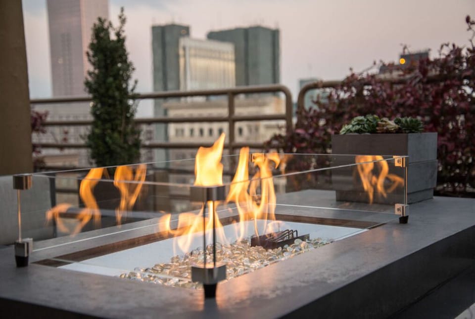 Warm up by the cozy outdoor fire pit, perfect for evenings.