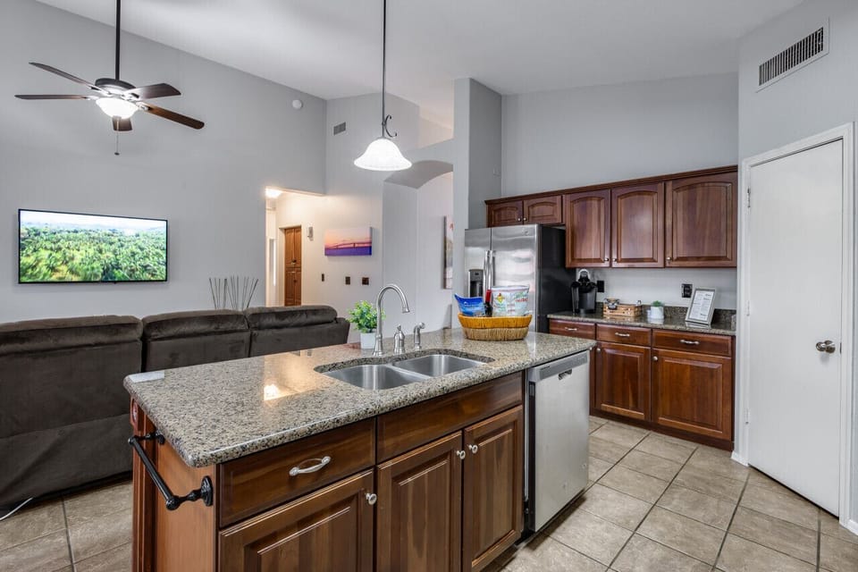 Kitchen and seating area with TV