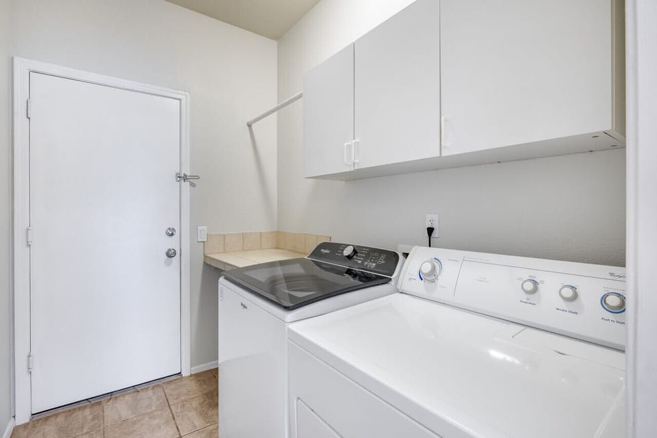 Laundry room with washer and dryer