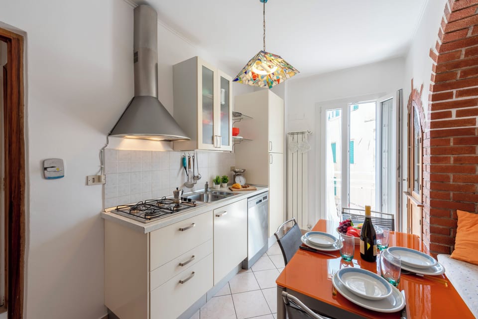 Family Apartment, Multiple Bedrooms (Kimera Del Parasio) | Private kitchen | Fridge, stovetop, dishwasher, coffee/tea maker