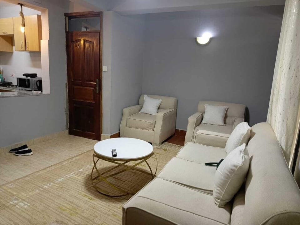 Comfort Apartment | Living area | 24-inch Smart TV with digital channels