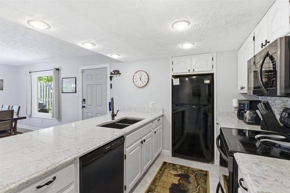 Modern appliances and stylish finishes create a perfect space for culinary adventures!