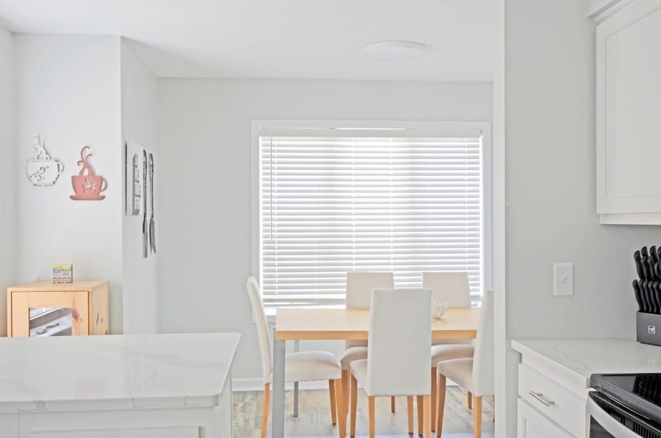 We can't get enough of the clean lines in the dining nook and the kitchen!