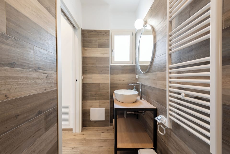 Superior Triple Room | Bathroom | Shower, hair dryer, bidet, towels