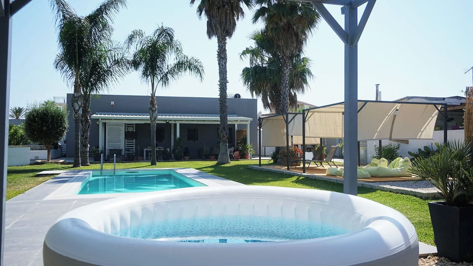 Apartment, Pool View | Private spa tub
