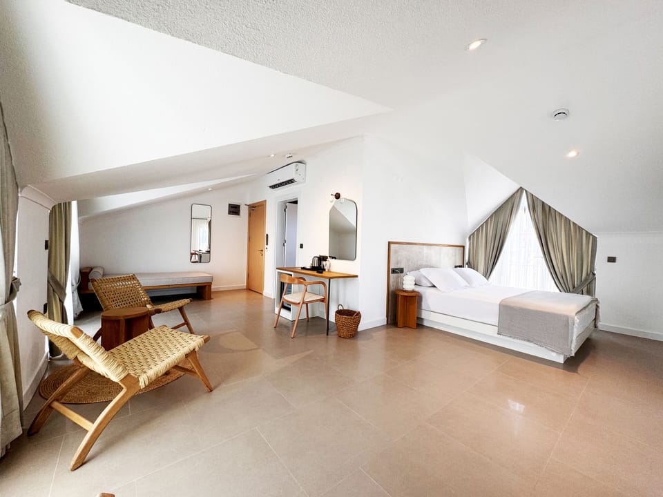 Premium bedding, minibar, desk, laptop workspace