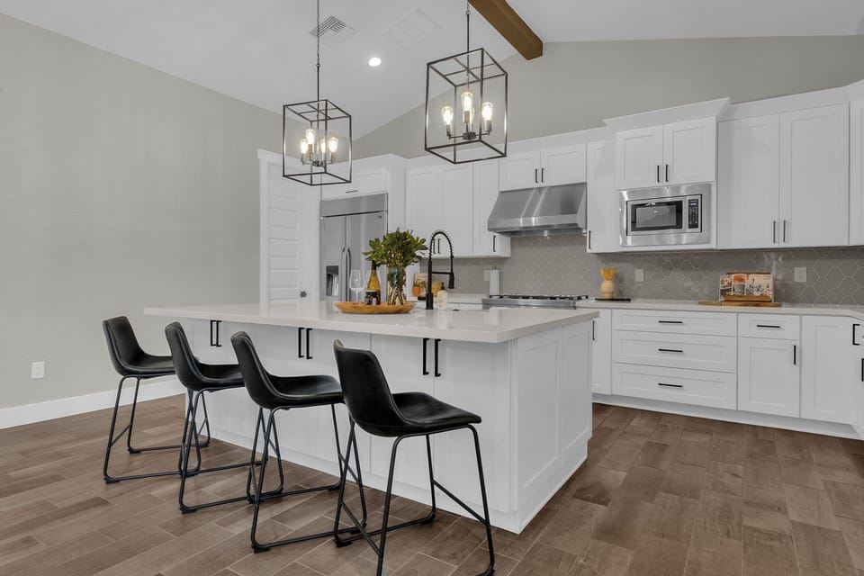 Beautiful open concept kitchen with large refrigerator