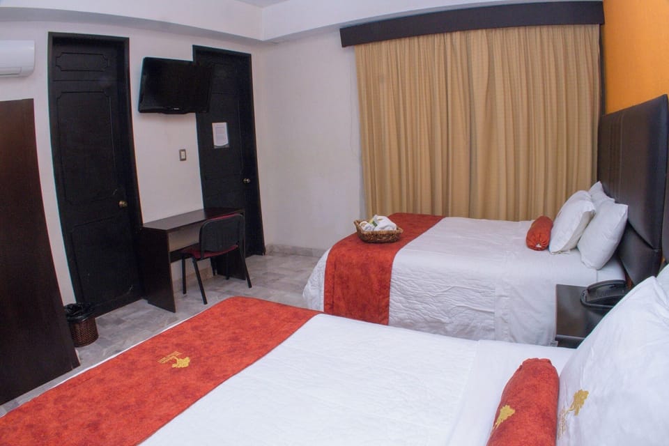 Standard Quadruple Room | Desk, iron/ironing board