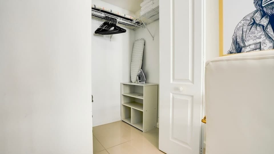 Organized elegance: Your dedicated clothing area combines functionality and style, providing ample space for storage and organization while maintaining a chic and tidy aesthetic in your living space.