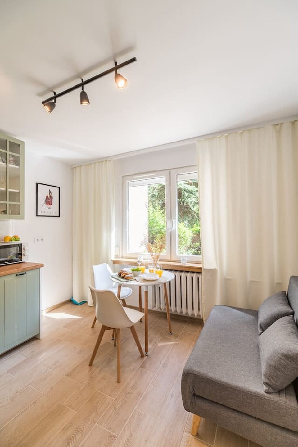 Comfortable Living Room with Sofa Bed and Smart TV | Book Now with RENTUJEMY