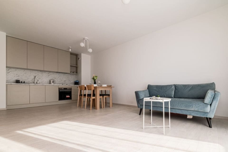 Comfortable Living Room with Sofa Bed and Smart TV | Book Now with RENTUJEMY