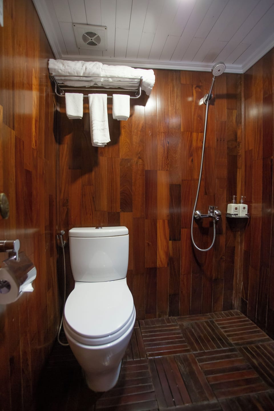 Hydromassage showerhead, designer toiletries, hair dryer, slippers
