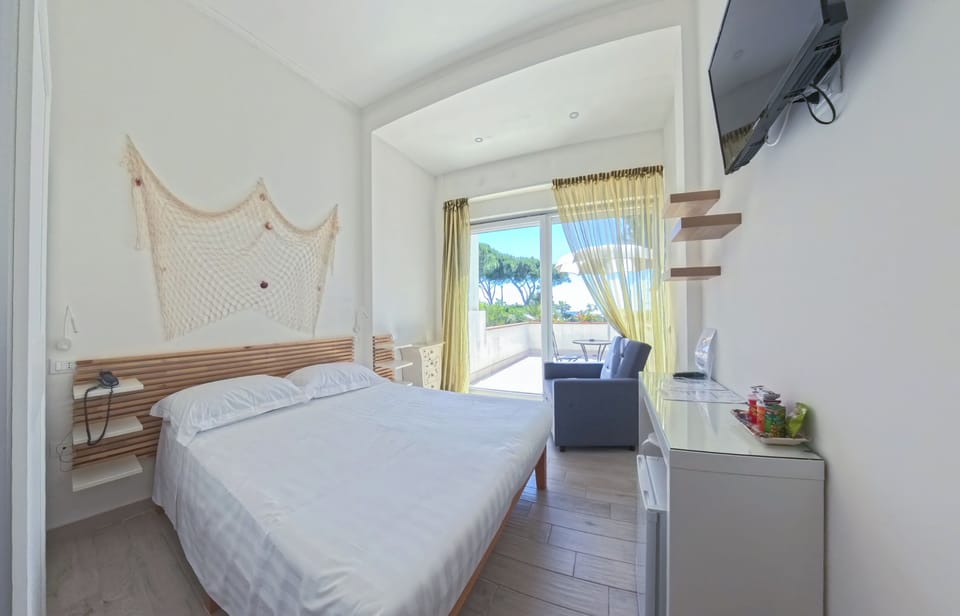 Superior Room, Balcony, Sea View | In-room safe, desk, iron/ironing board, free WiFi