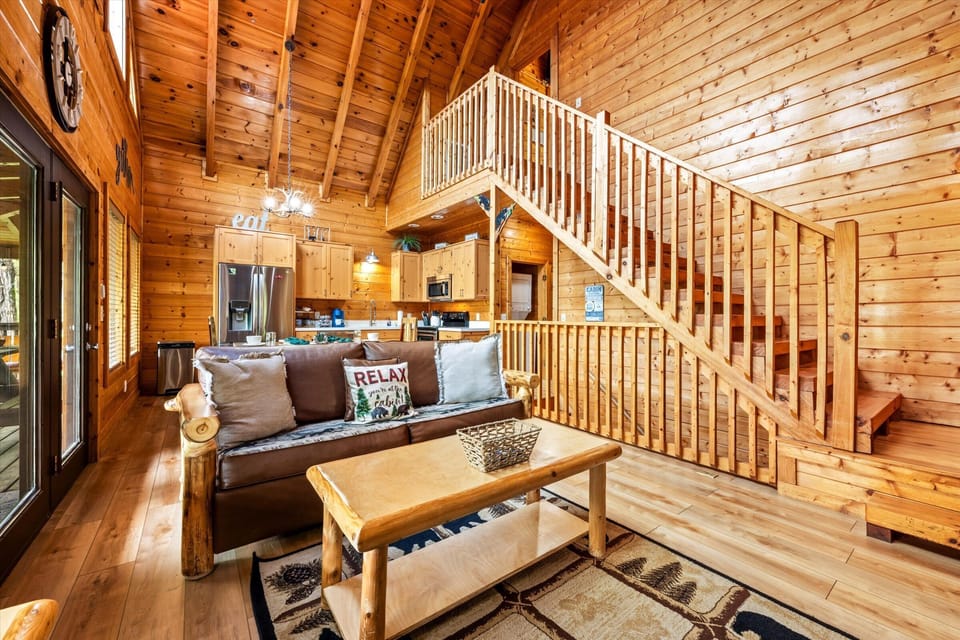 Living Room with access to upper level. 