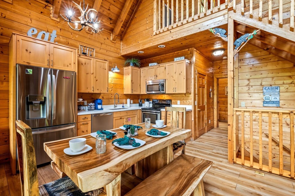 Full Kitchen with large table.